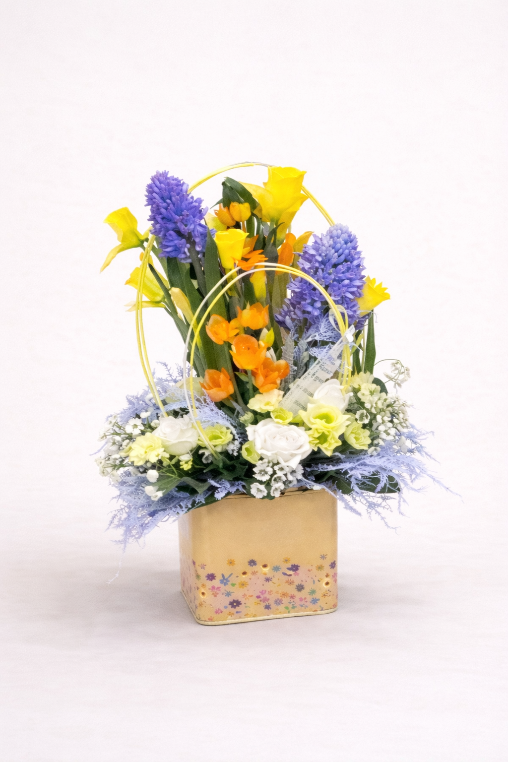 Composition florale dans contenant